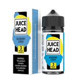 Juice Head Blueberry Lemon e-liquid bottle against a backdrop of fresh blueberries and lemons.